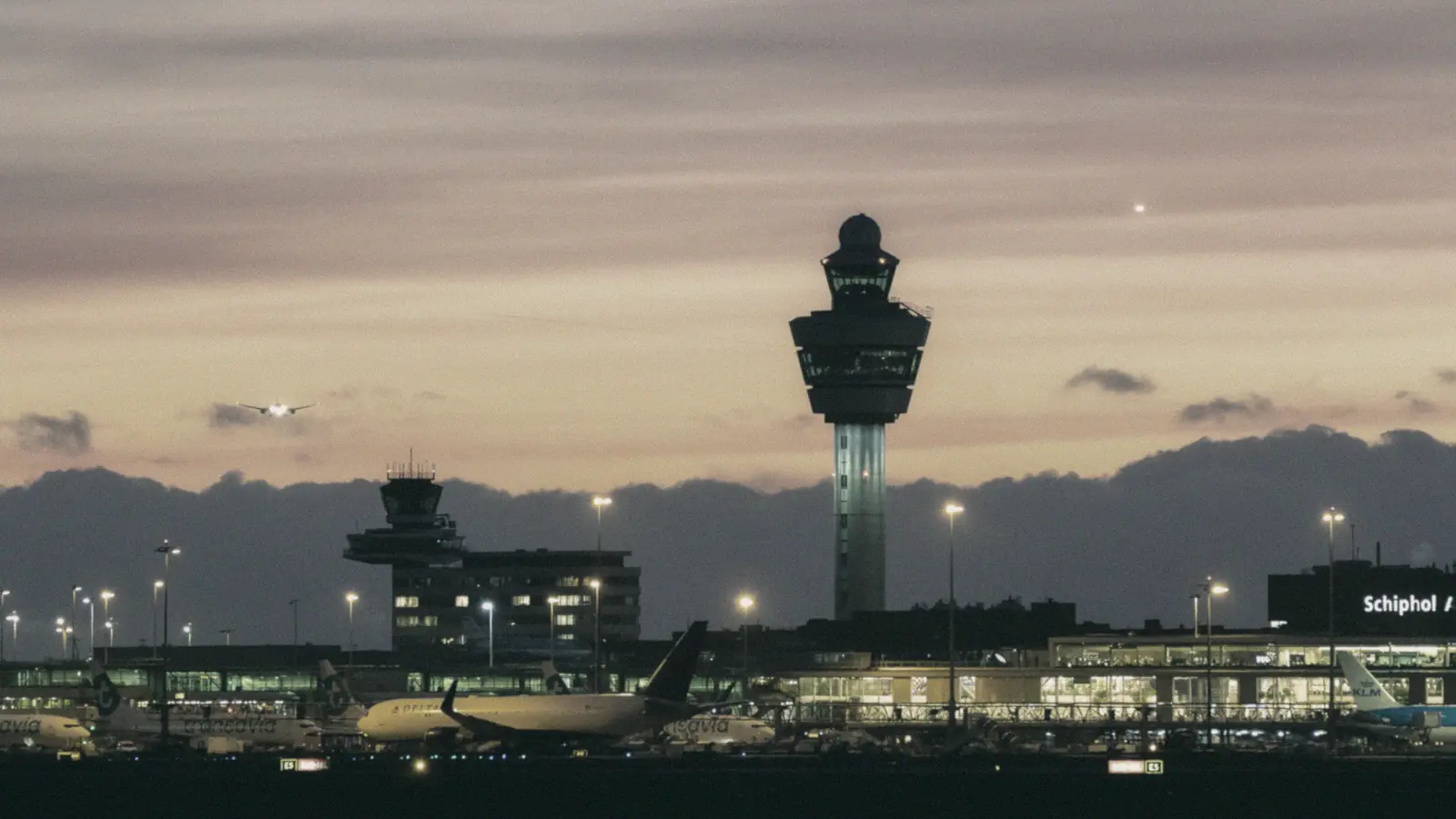 Schiphol control tower at sunset